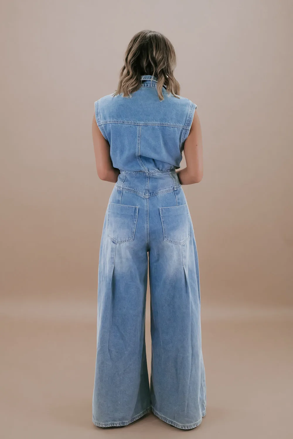 Doing The Most Denim Button Up Jumpsuit