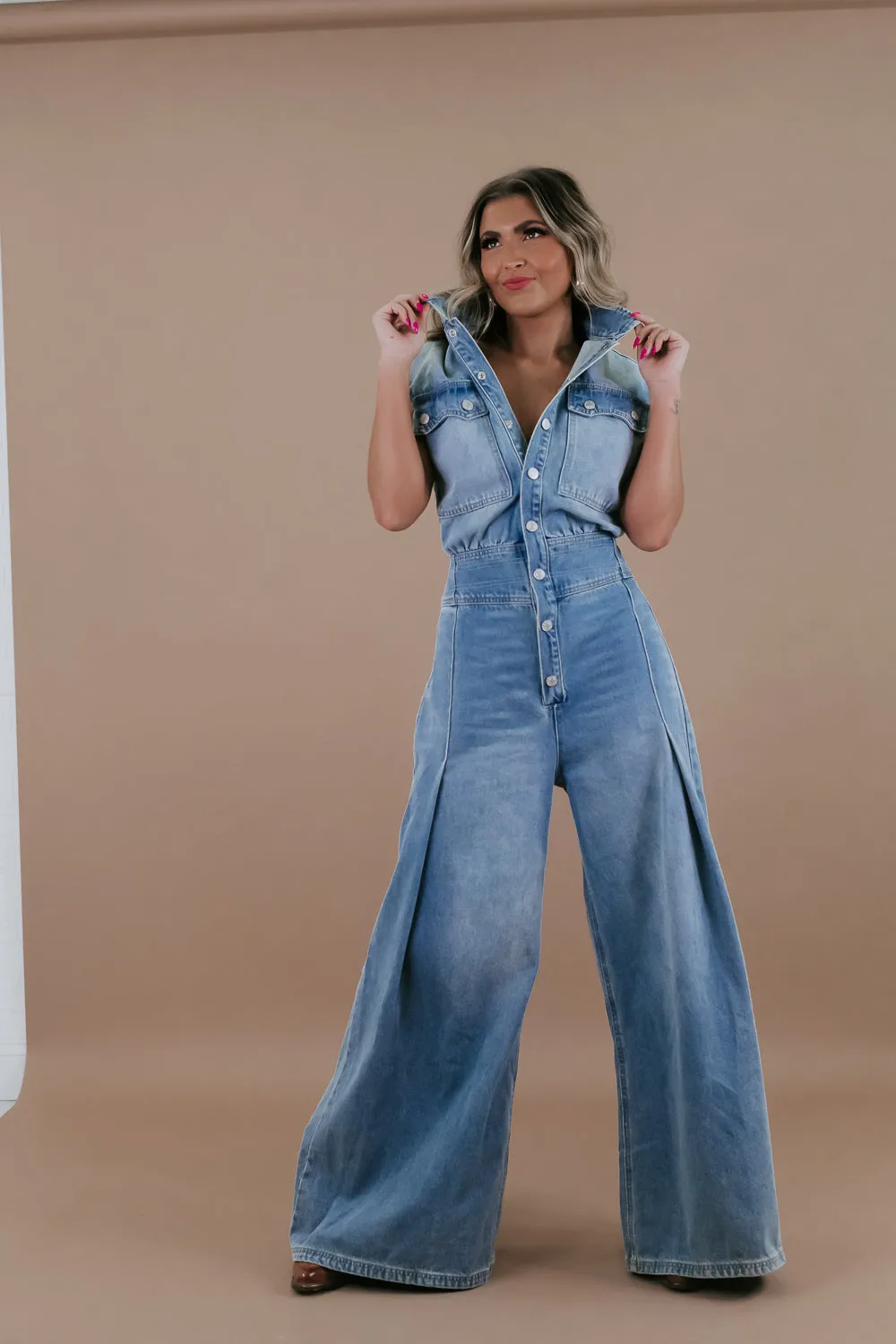 Doing The Most Denim Button Up Jumpsuit