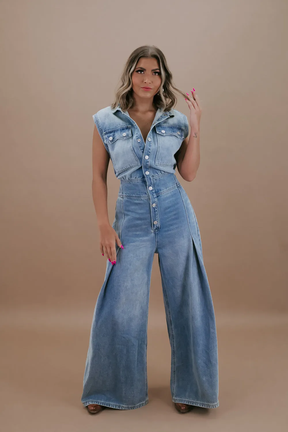 Doing The Most Denim Button Up Jumpsuit